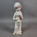 Figurka porcelanowa chłopiec z pieskiem 