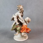 Figurka porcelanowa Capodimonte Włochy chłopczyk i dziewczynka 