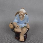 Figurka porcelanowa Shiwan siedzący mędrzec