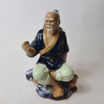 Figurka porcelanowa  rybaka Chińczyka Shiwan 
